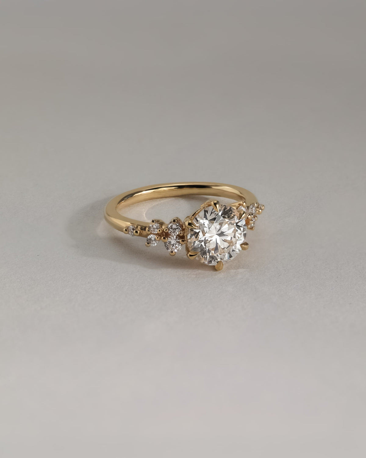 Molly - Round Claw Solitaire with Clustered Round Shoulder Stones Engagement Ring - White Gold