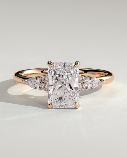 Heidi - Radiant Claw Solitaire with Pear Accents and Round Shoulder Stones Engagement Ring - Rose Gold