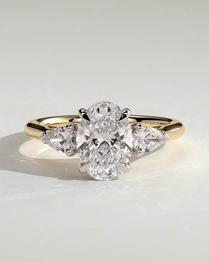 Alexia - Oval Claw Trilogy with Pear Side Stones and Cathedral Setting Engagement Ring - Yellow Two-Tone - yellow two-tone - Lara Jewels