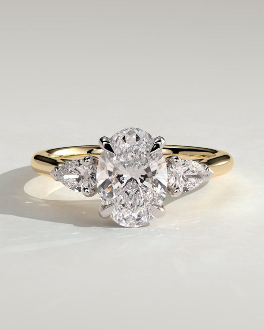 Alexia - Oval Claw Trilogy with Pear Side Stones and Cathedral Setting Engagement Ring - Yellow Two-Tone - yellow two-tone - Lara Jewels