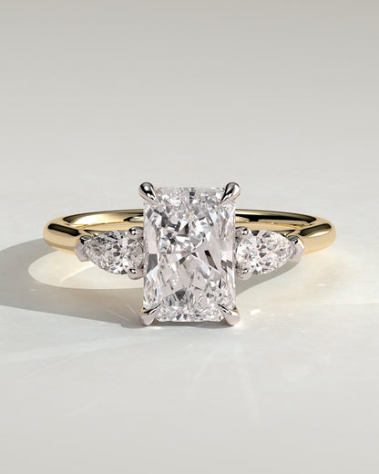 Jasmine - Radiant Claw Trilogy with Pear Side Stones and Cathedral Setting Engagement Ring - Yellow Two-Tone
