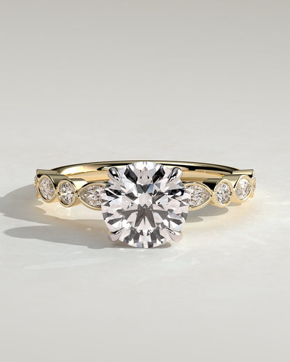 Cartia - Round Claw Solitaire with Round-Marquise Bezel Accent Stones Engagement Ring - Yellow Two-Tone