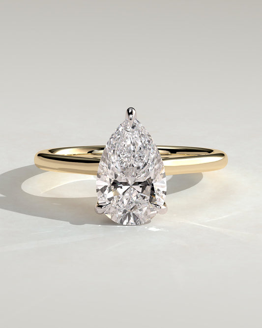 Kimberly - Pear Claw Solitaire with Hidden Halo and Cathedral High Setting Engagement Ring - Yellow Two-Tone