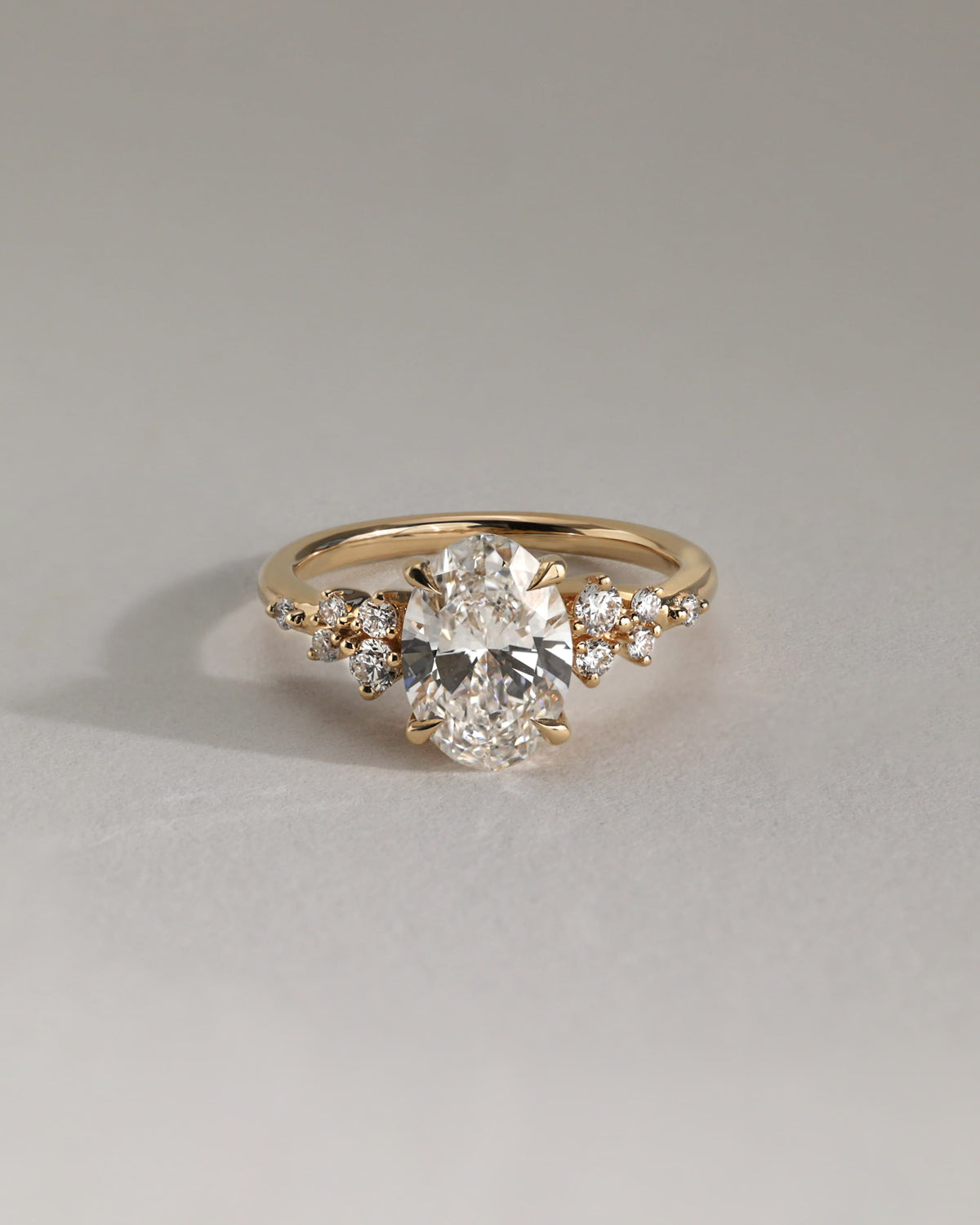 Bella - Oval Claw Solitaire with Clustered Round Shoulder Stones Engagement Ring - Rose Gold