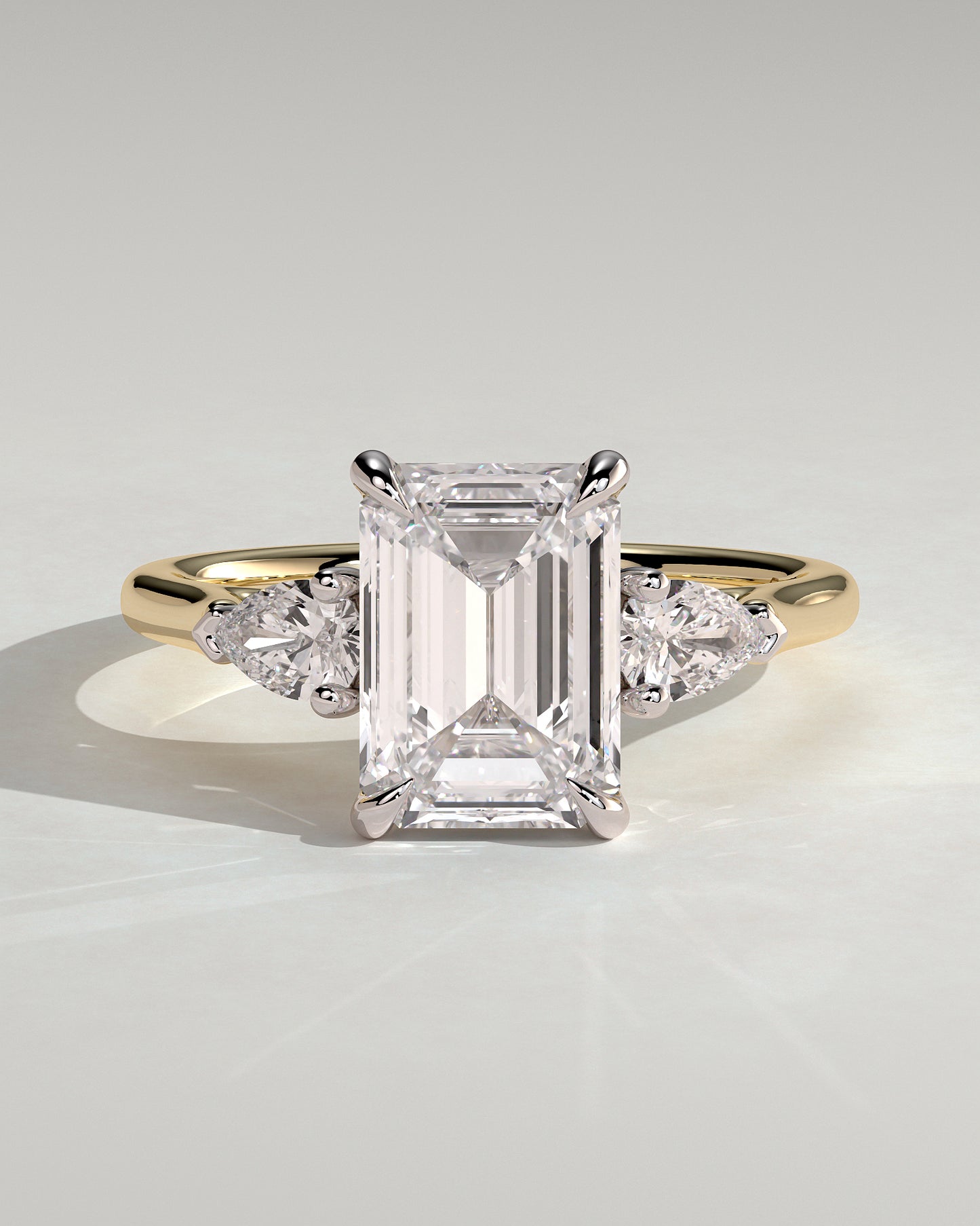 Davina - Emerald Claw Trilogy with Pear Side Stones and Cathedral Setting Engagement Ring - Yellow Two-Tone