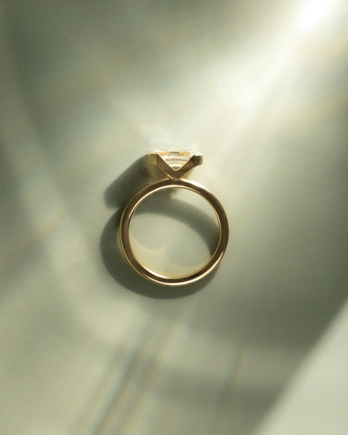 Jodie - Emerald East West Half Bezel Solitaire Engagement Ring - Yellow Gold