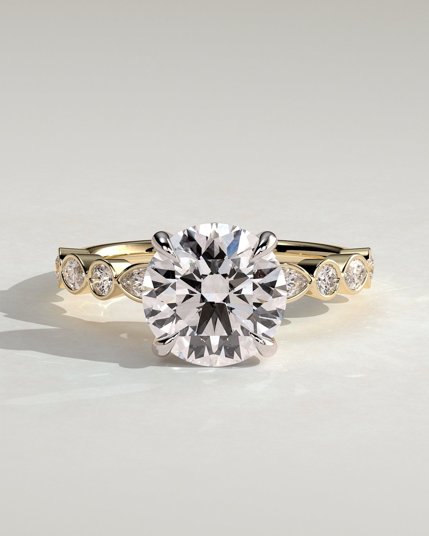 Cartia - Round Claw Solitaire with Round-Marquise Bezel Accent Stones Engagement Ring - Yellow Two-Tone