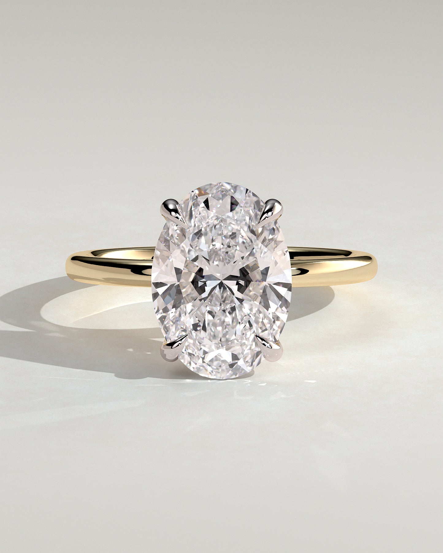 Daisy - Classic Oval Claw Solitaire Engagement Ring - Yellow Two-Tone