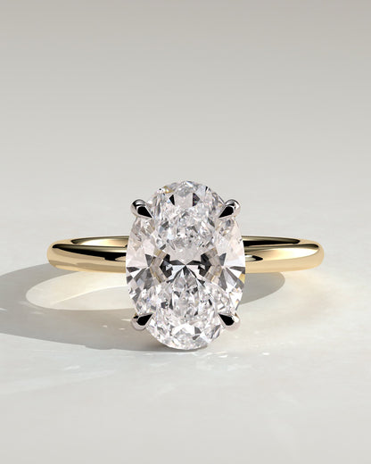 Emma - Classic Oval Claw Solitaire with Hidden Halo Engagement Ring - Yellow Two-Tone