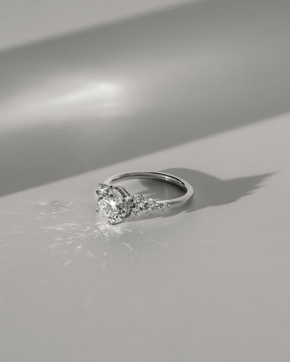 Molly - Round Claw Solitaire with Clustered Round Shoulder Stones Engagement Ring - Platinum