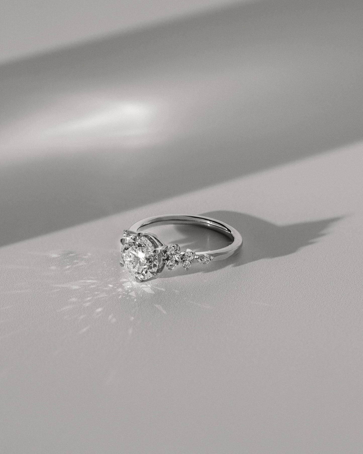 Molly - Round Claw Solitaire with Clustered Round Shoulder Stones Engagement Ring - Yellow Gold