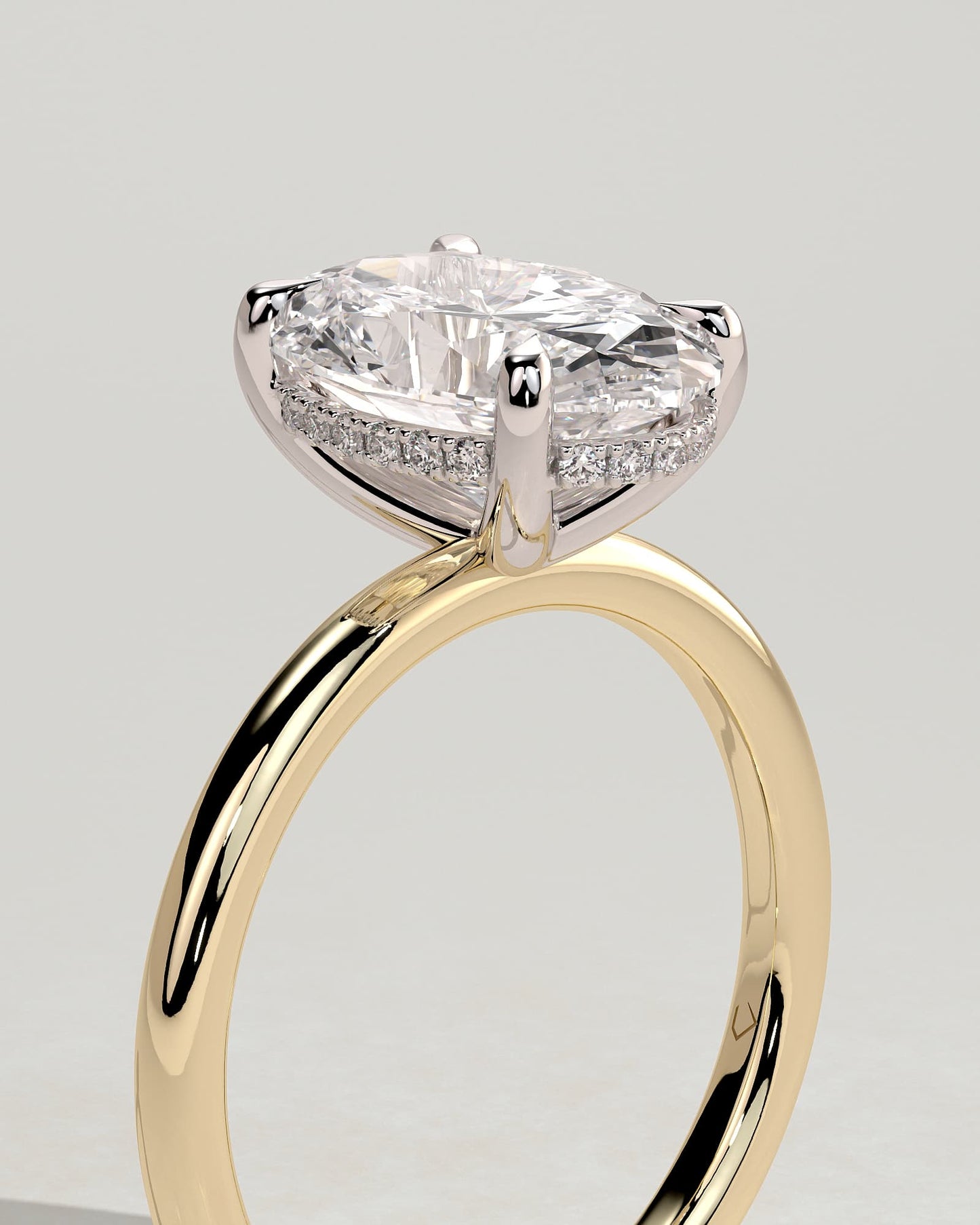 Emma - Classic Oval Claw Solitaire with Hidden Halo Engagement Ring - Yellow Two-Tone
