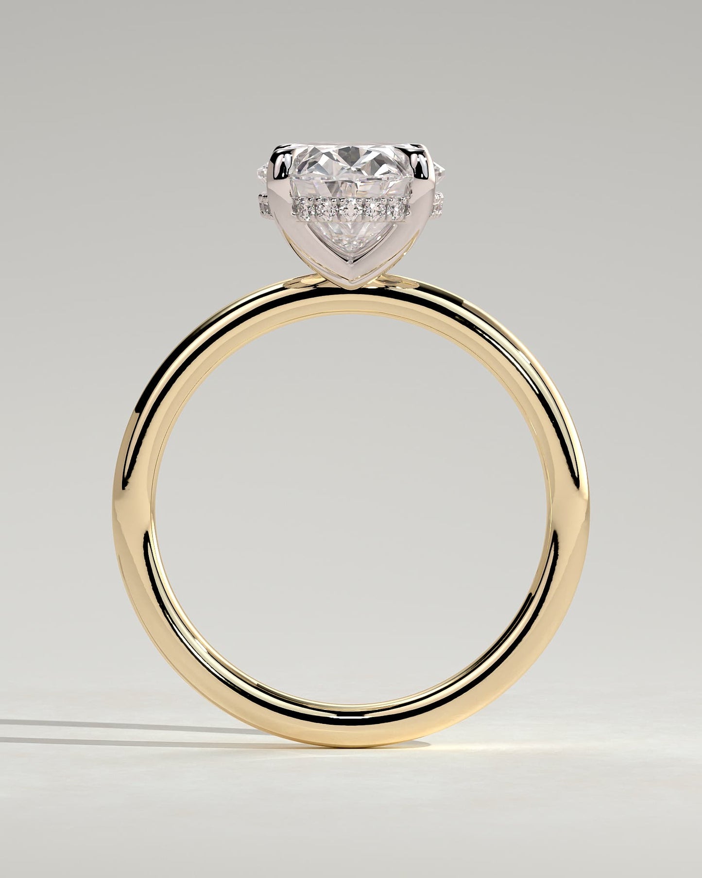 Emma - Classic Oval Claw Solitaire with Hidden Halo Engagement Ring - Yellow Two-Tone