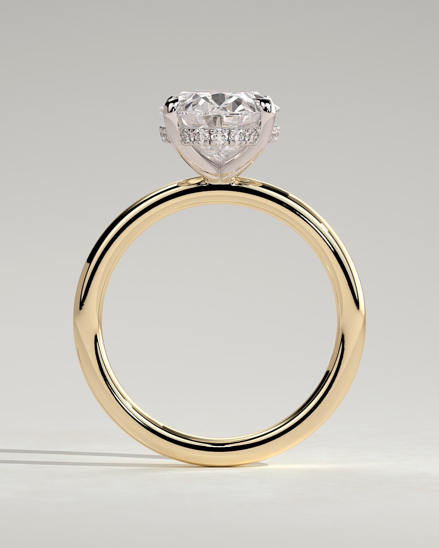 Emma - Classic Oval Claw Solitaire with Hidden Halo Engagement Ring - Yellow Two-Tone