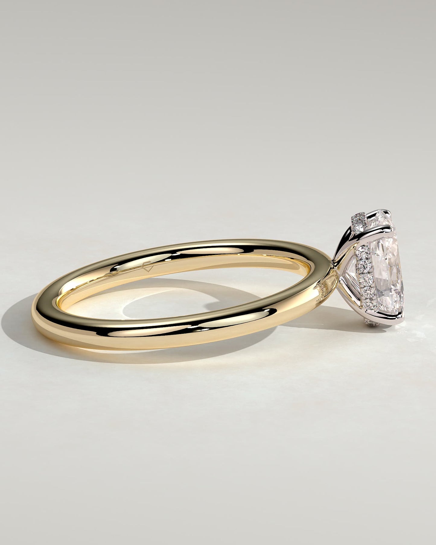 Emma - Classic Oval Claw Solitaire with Hidden Halo Engagement Ring - Yellow Two-Tone