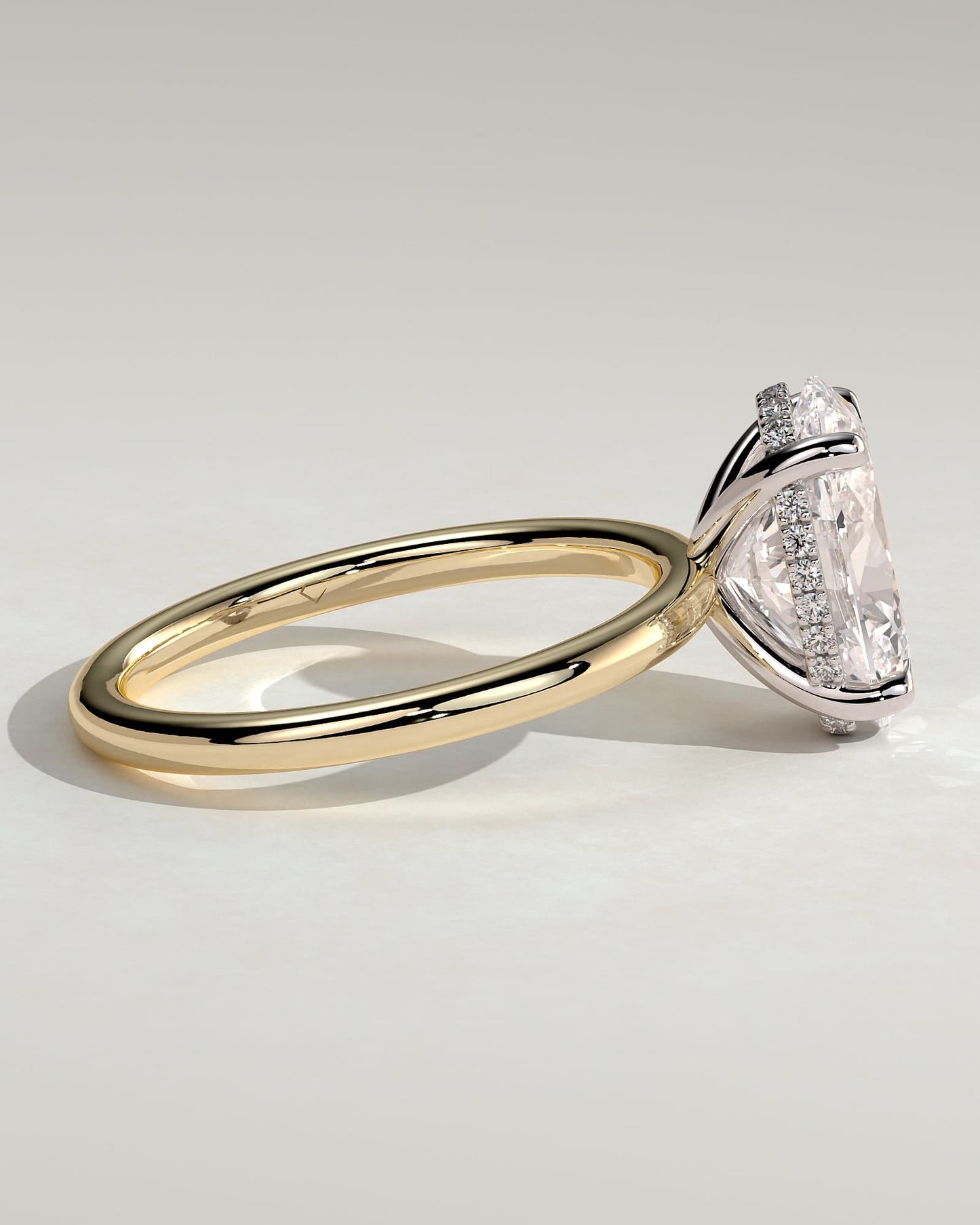 Emma - Classic Oval Claw Solitaire with Hidden Halo Engagement Ring - Yellow Two-Tone