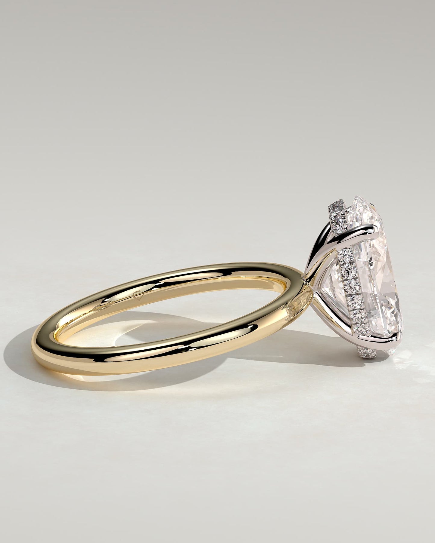 Emma - Classic Oval Claw Solitaire with Hidden Halo Engagement Ring - Yellow Two-Tone