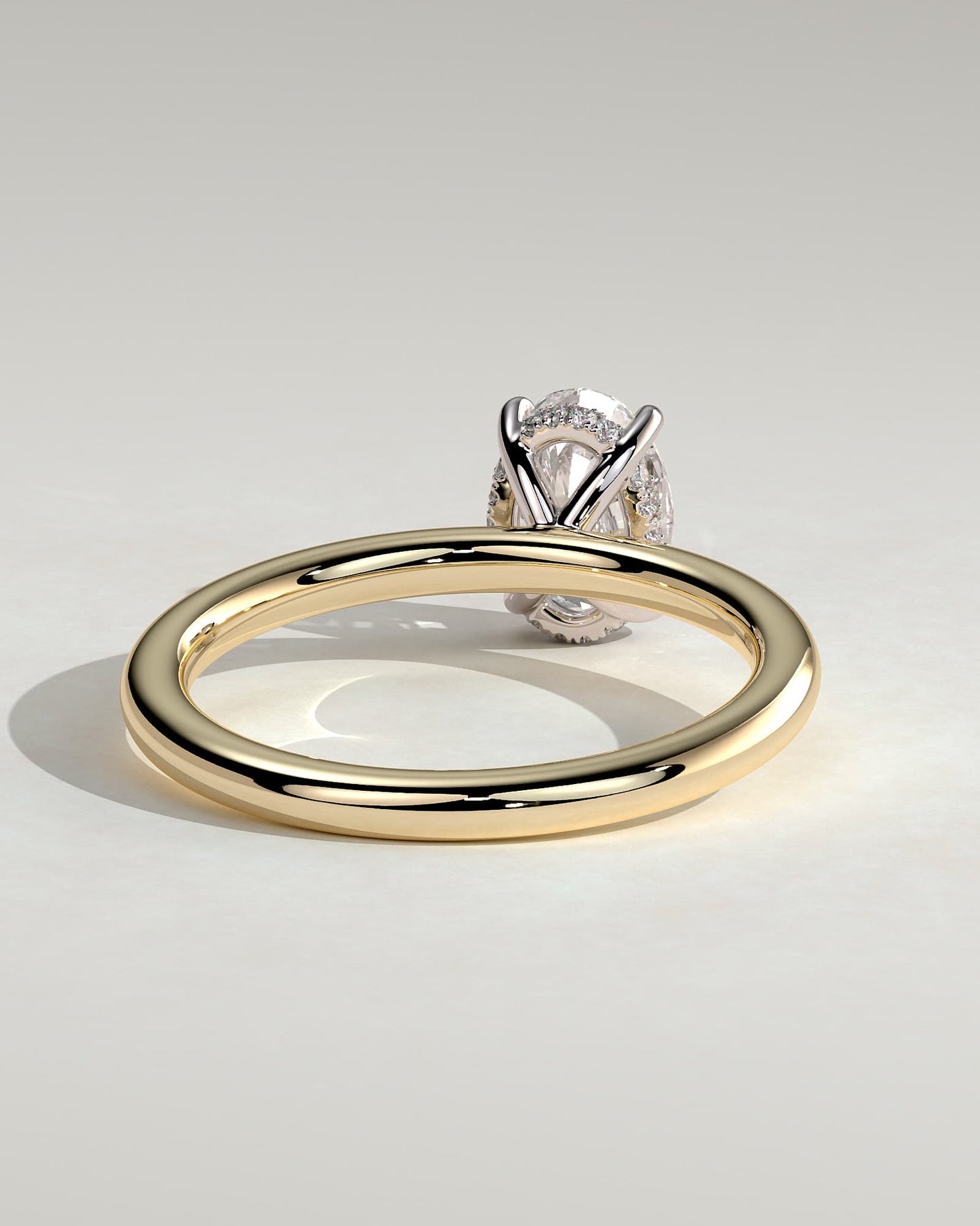 Emma - Classic Oval Claw Solitaire with Hidden Halo Engagement Ring - Yellow Two-Tone