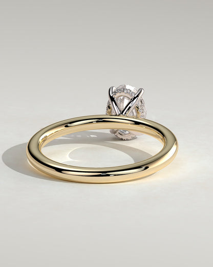 Emma - Classic Oval Claw Solitaire with Hidden Halo Engagement Ring - Yellow Two-Tone