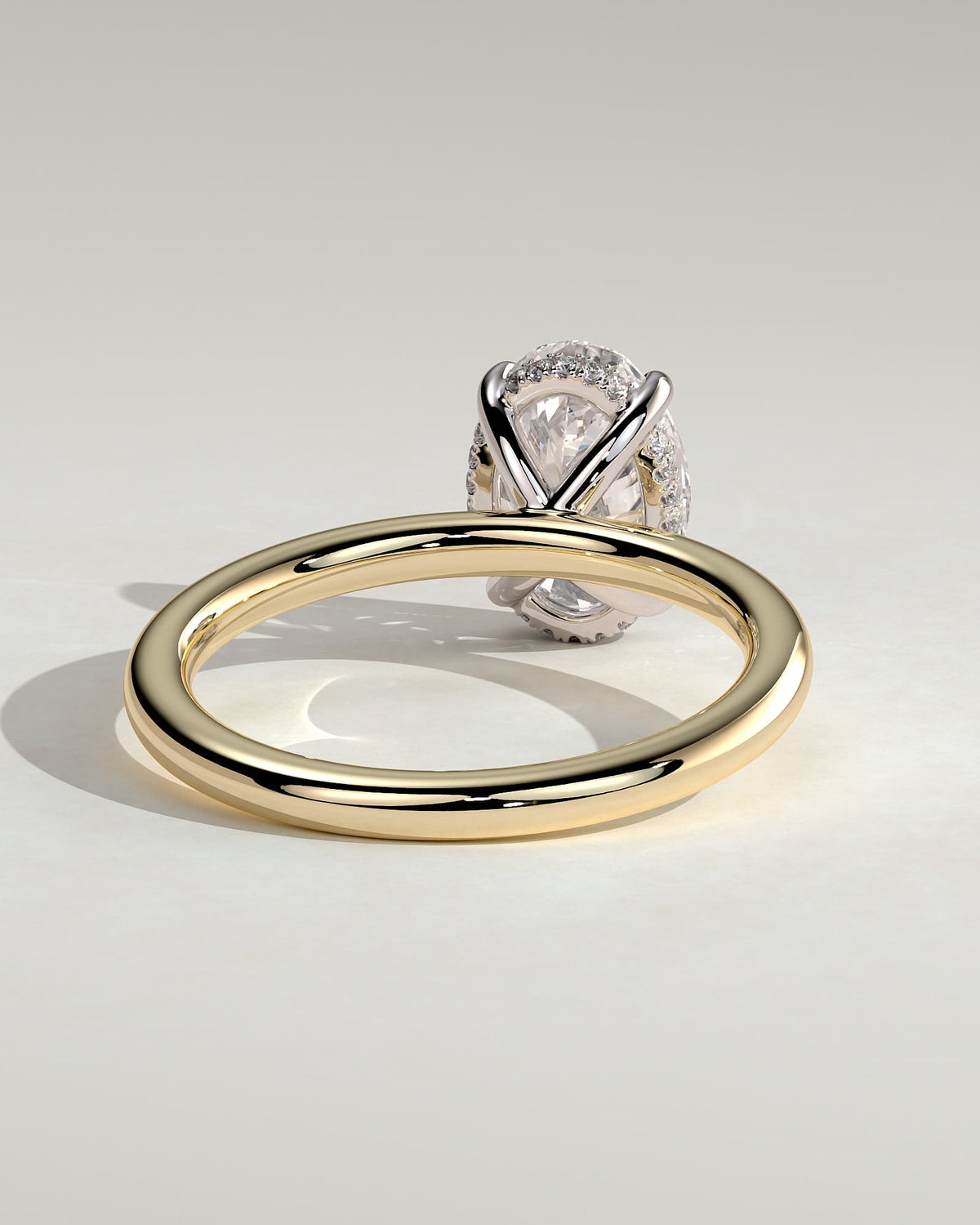 Emma - Classic Oval Claw Solitaire with Hidden Halo Engagement Ring - Yellow Two-Tone