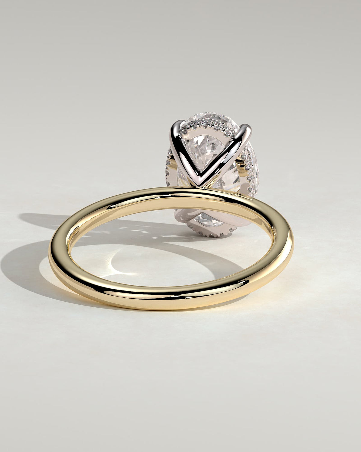 Emma - Classic Oval Claw Solitaire with Hidden Halo Engagement Ring - Yellow Two-Tone