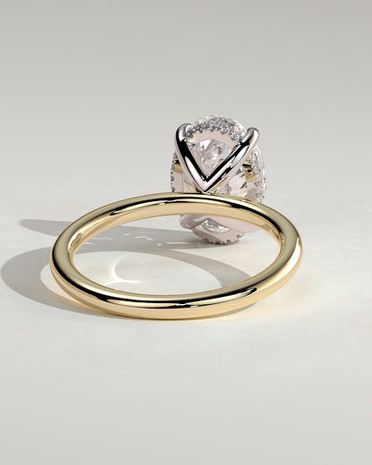 Emma - Classic Oval Claw Solitaire with Hidden Halo Engagement Ring - Yellow Two-Tone