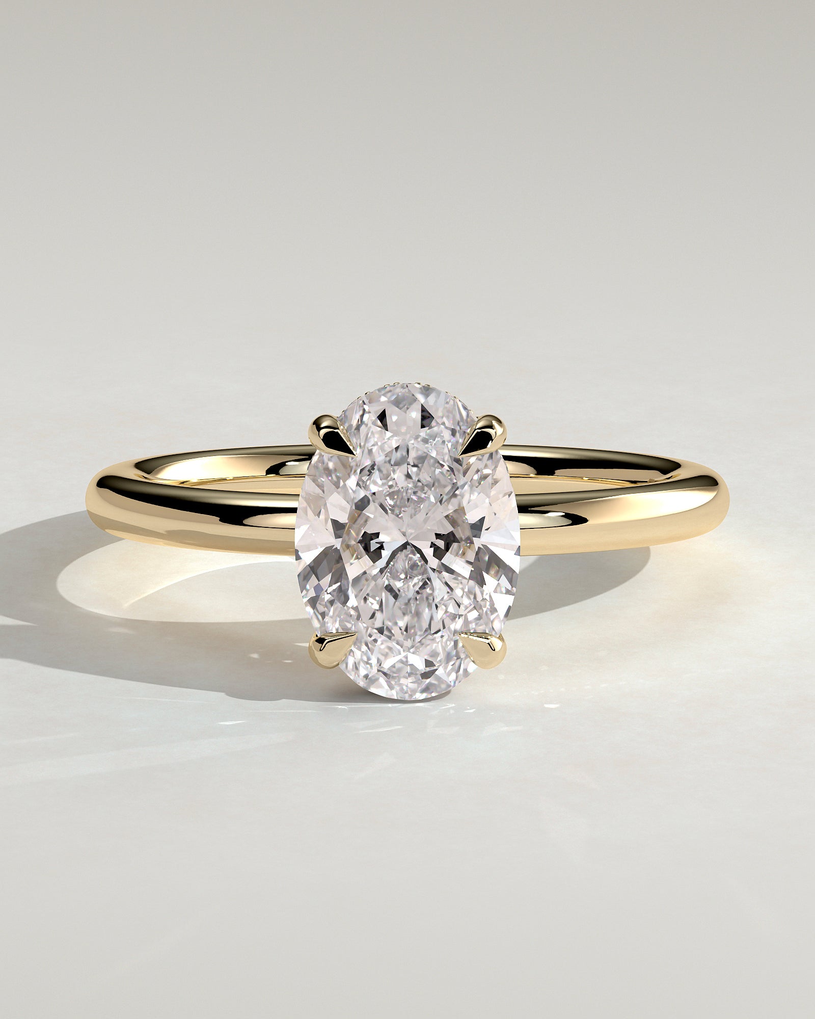 Emma - Classic Oval 4 Claw Solitaire with Hidden Halo Engagement Ring - 18k Yellow Gold High Setting