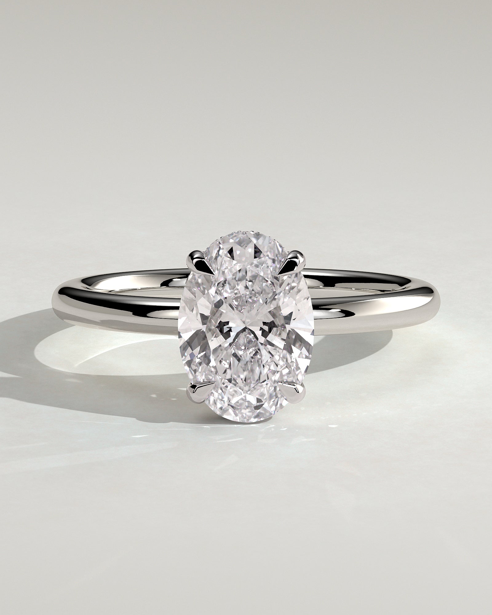 Emma - Classic Oval Claw Solitaire with Hidden Halo Engagement Ring - Platinum - White Gold / Platinum