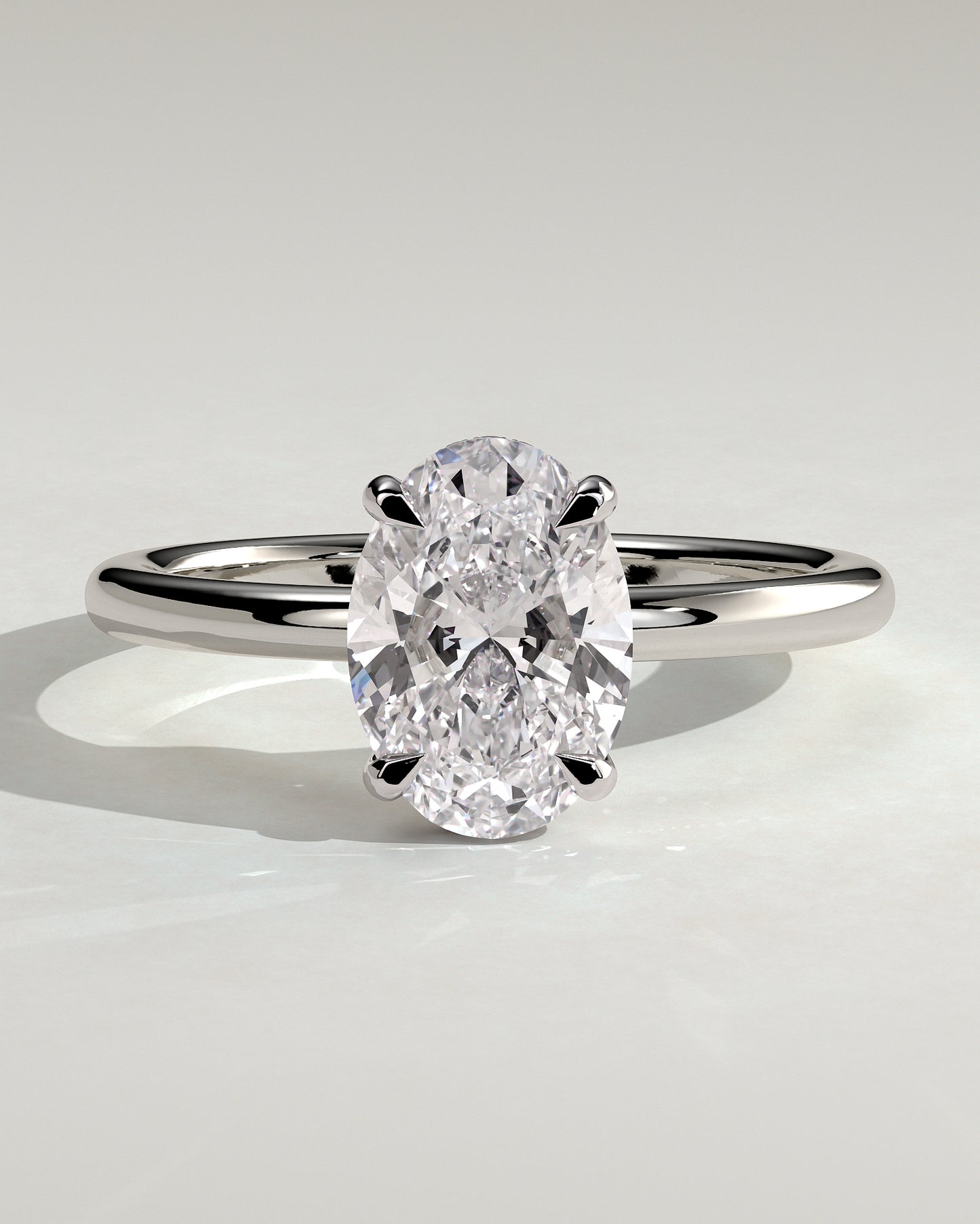 Emma - Classic Oval Claw Solitaire with Hidden Halo Engagement Ring - Platinum - White Gold / Platinum