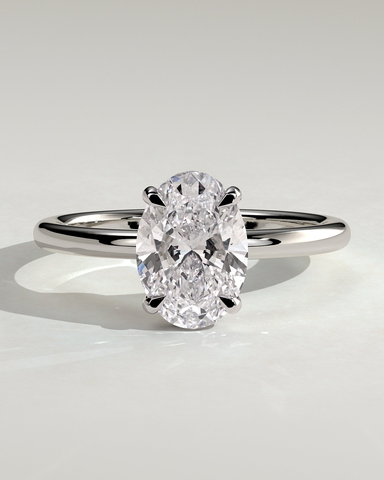 Emma - Classic Oval Claw Solitaire with Hidden Halo Engagement Ring - Platinum - White Gold / Platinum