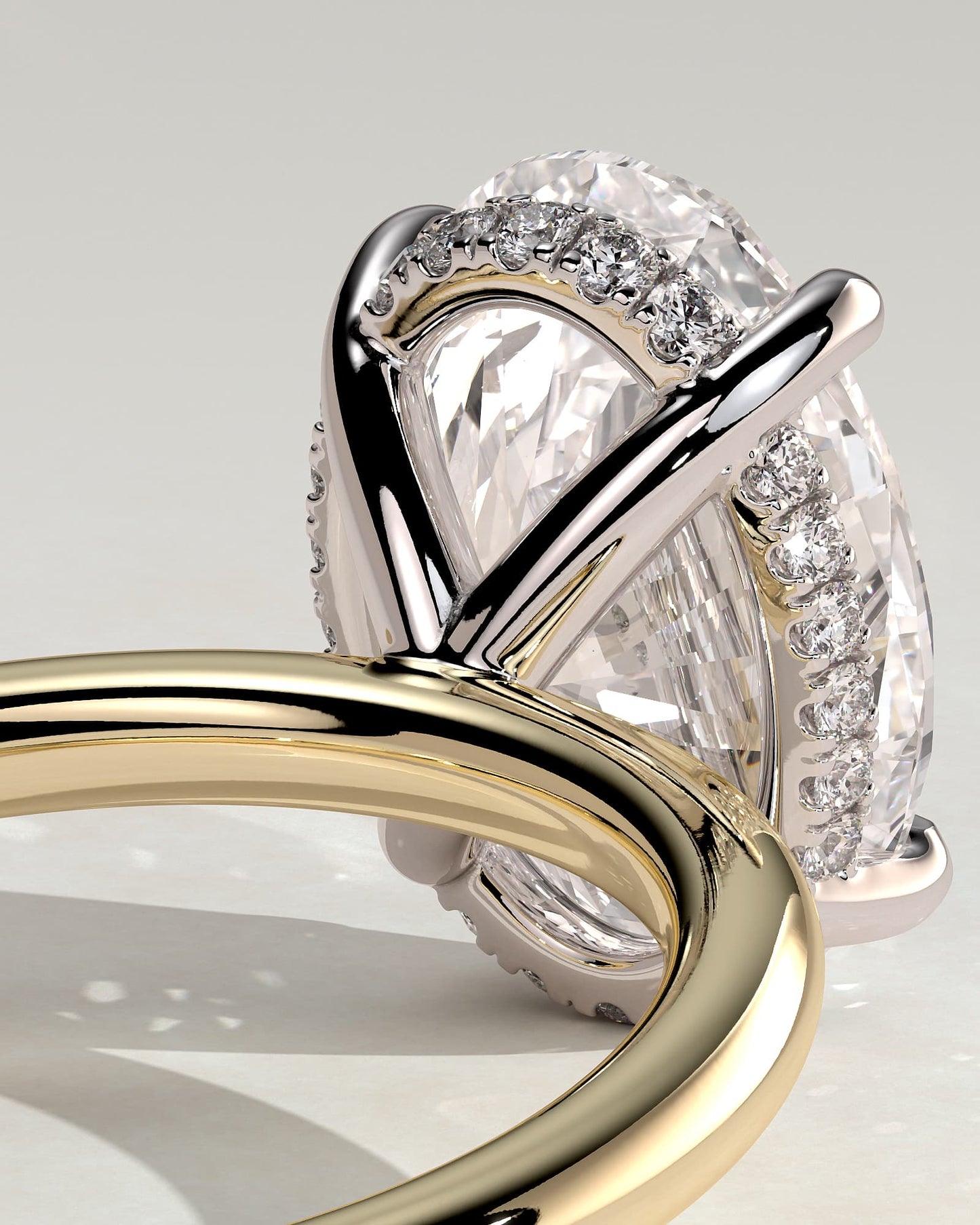 Emma - Classic Oval Claw Solitaire with Hidden Halo Engagement Ring - Yellow Two-Tone