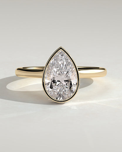 Jude - Pear Bezel Solitaire with Hidden Halo and Cathedral High Setting Engagement Ring - Yellow Gold