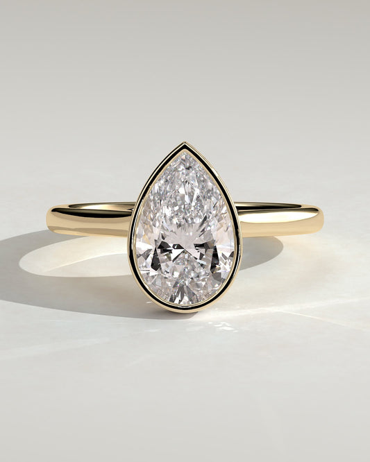 Jude - Pear Bezel Solitaire with Hidden Halo and Cathedral High Setting Engagement Ring - Yellow Gold