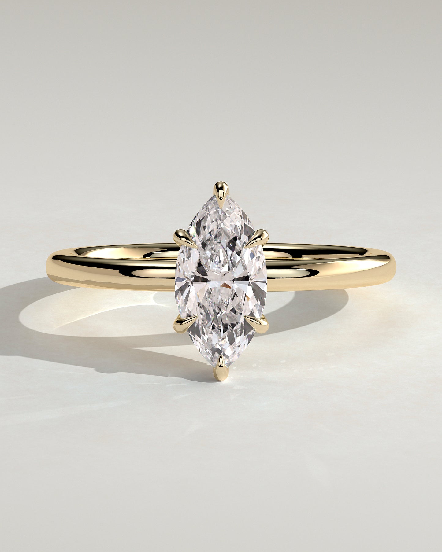Claire - Marquise Claw Solitaire with Wrap Around Hidden Halo Engagement Ring - Yellow Gold