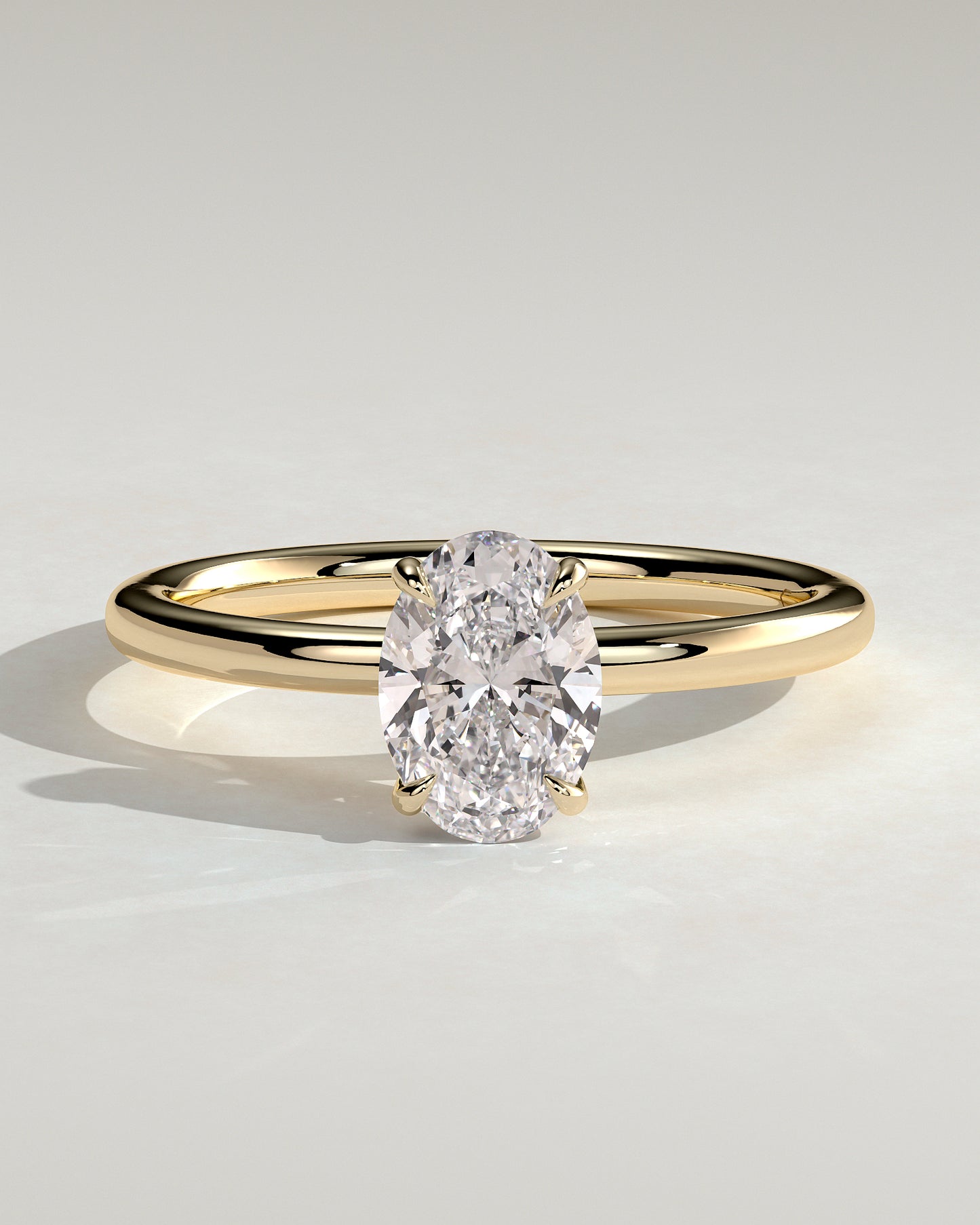 Daisy - Classic Oval Claw Solitaire Engagement Ring - Yellow Gold