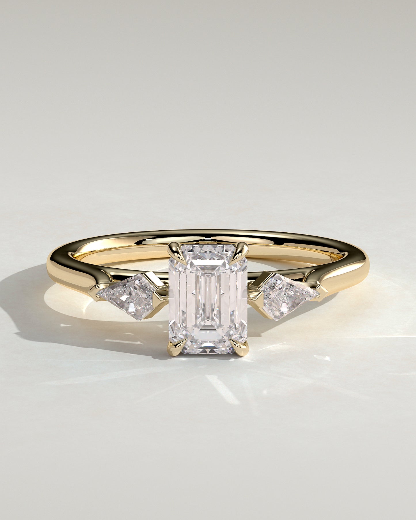 Elphie - Emerald Claw Trilogy with Kite Side Stones Engagement Ring - Yellow Gold