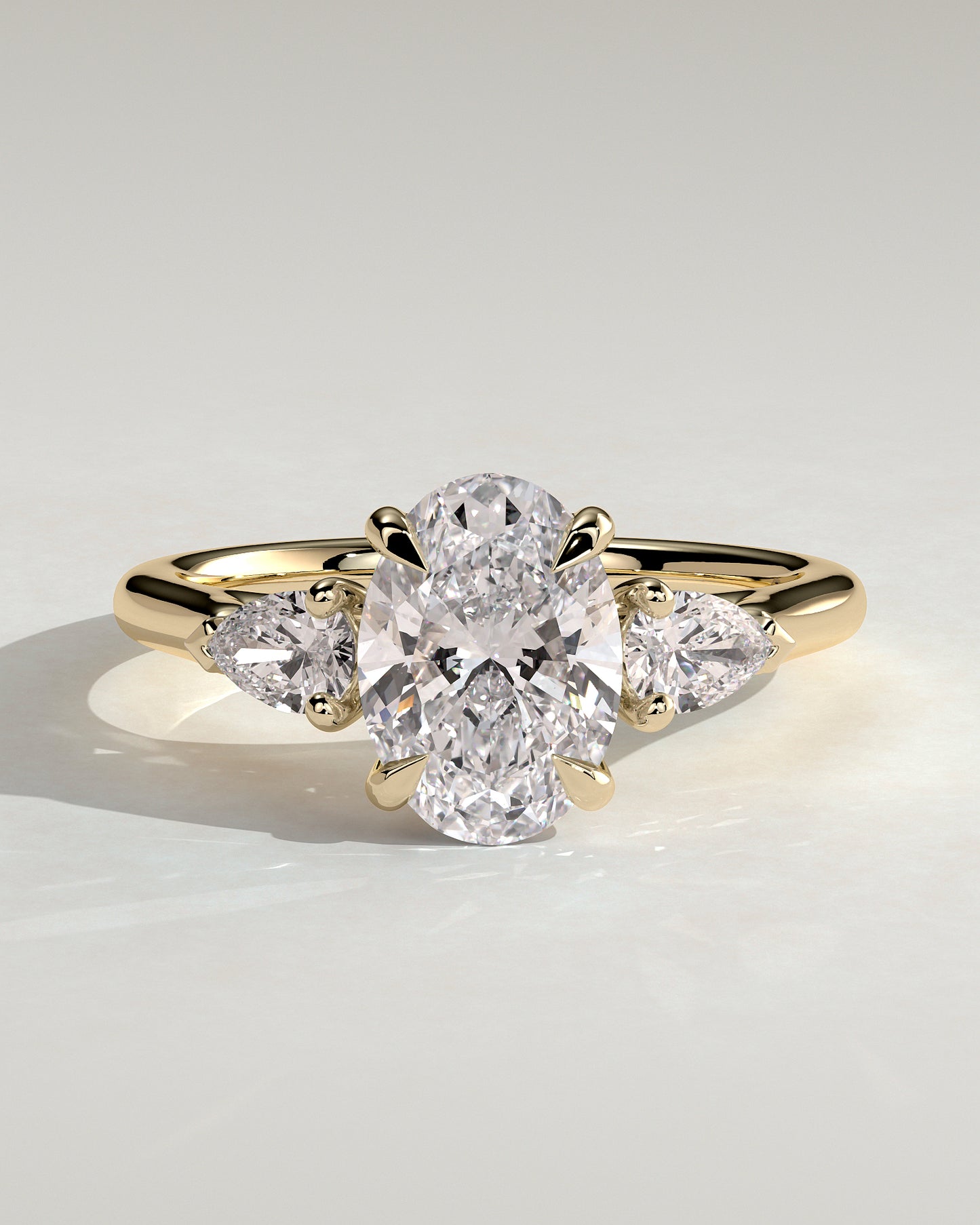 Alexia - Oval Claw Trilogy with Pear Side Stones and Cathedral Setting Engagement Ring - Yellow Gold - Yellow Gold 2ct