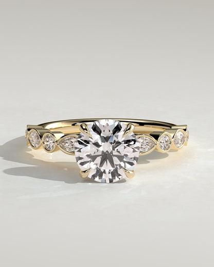 Cartia - Round Claw Solitaire with Round-Marquise Bezel Accent Stones Engagement Ring - Yellow Gold