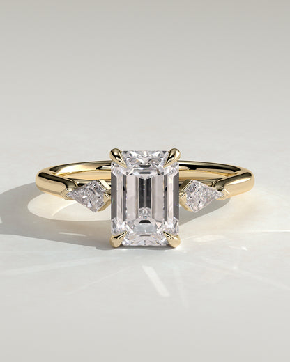 Elphie - Emerald Claw Trilogy with Kite Side Stones Engagement Ring - Platinum