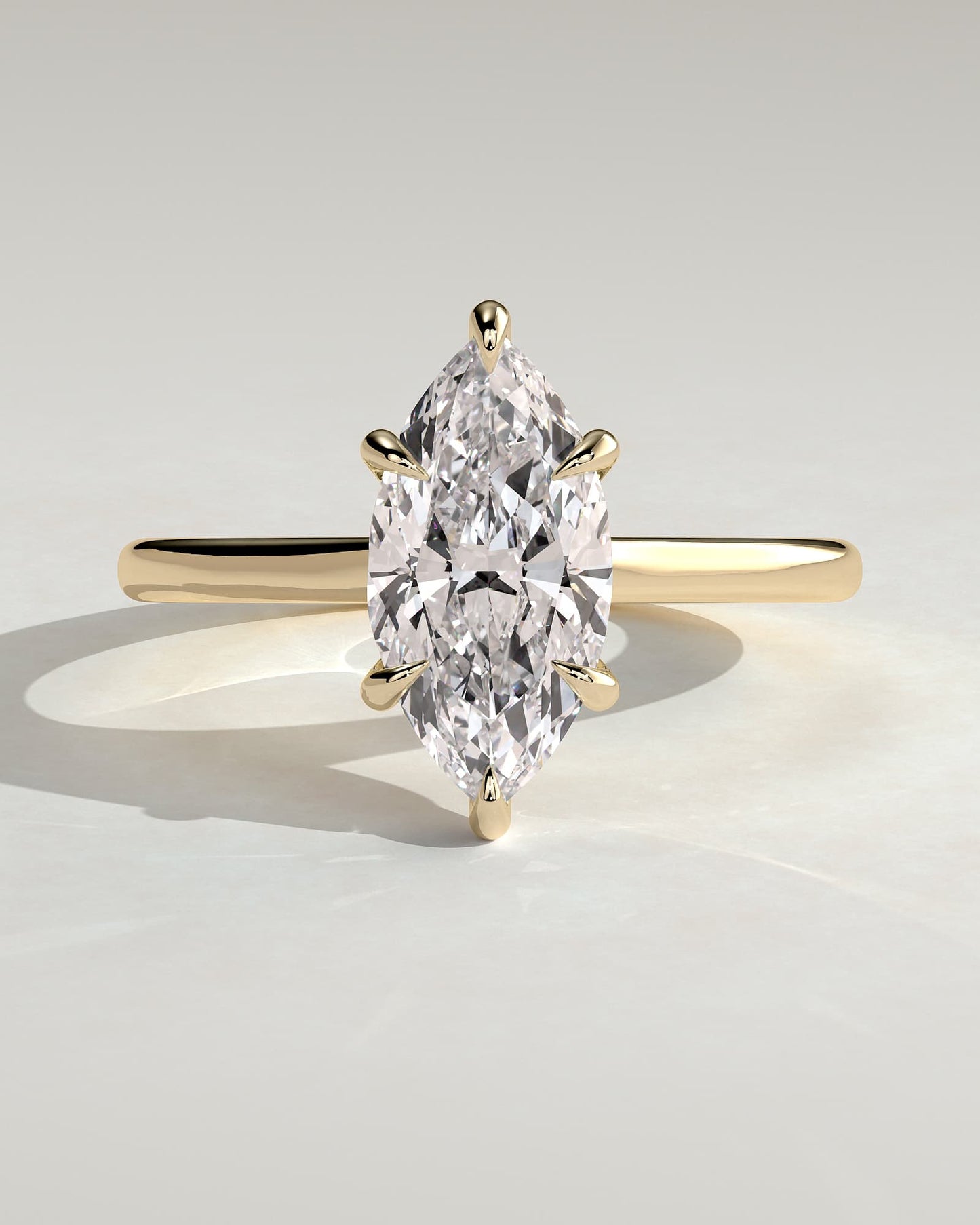 Jenna - Marquise Claw Solitaire with Hidden Halo and Cathedral High Setting Engagement Ring - Yellow Gold