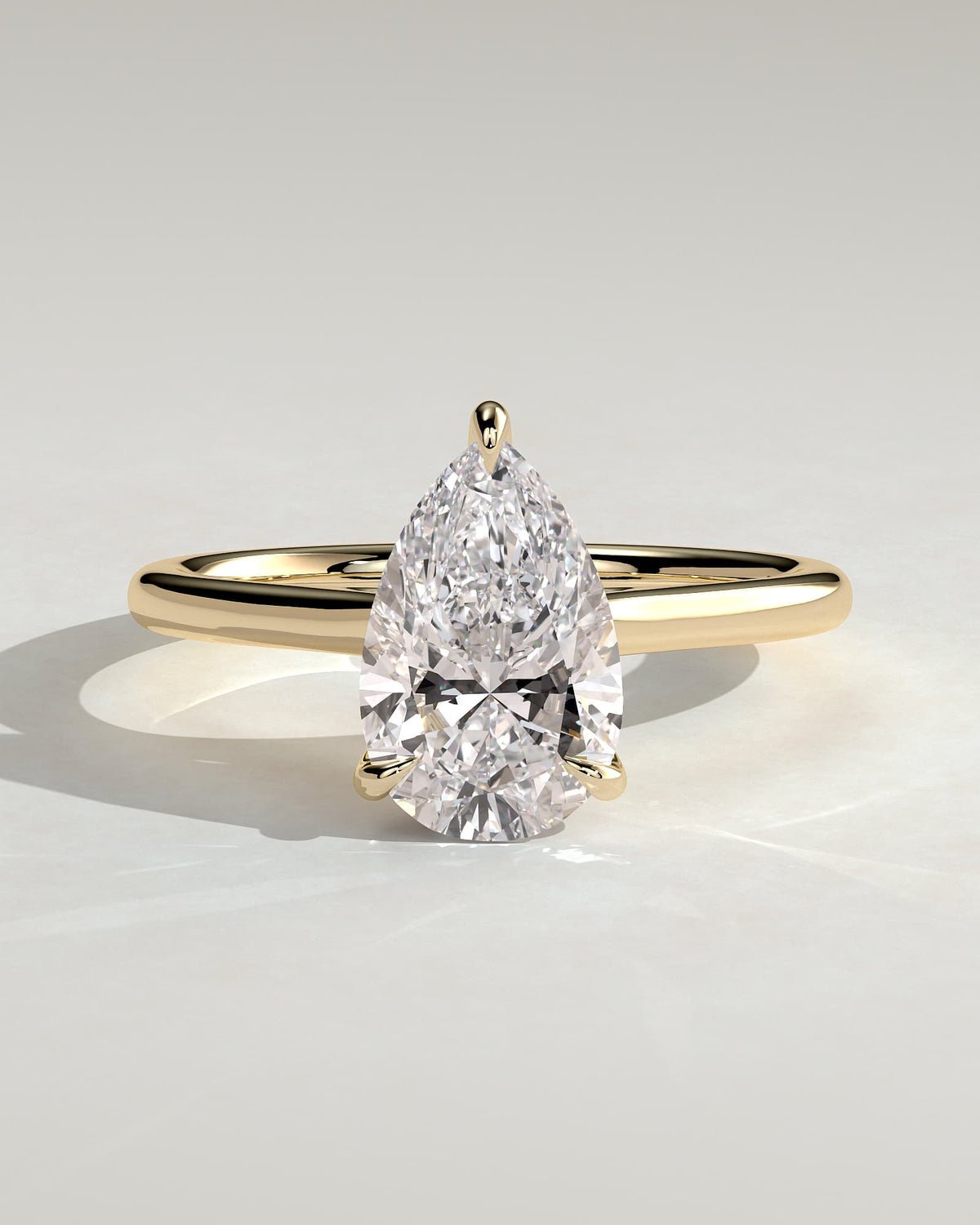 Kimberly - Pear Claw Solitaire with Hidden Halo and Cathedral High Setting Engagement Ring - Yellow Gold