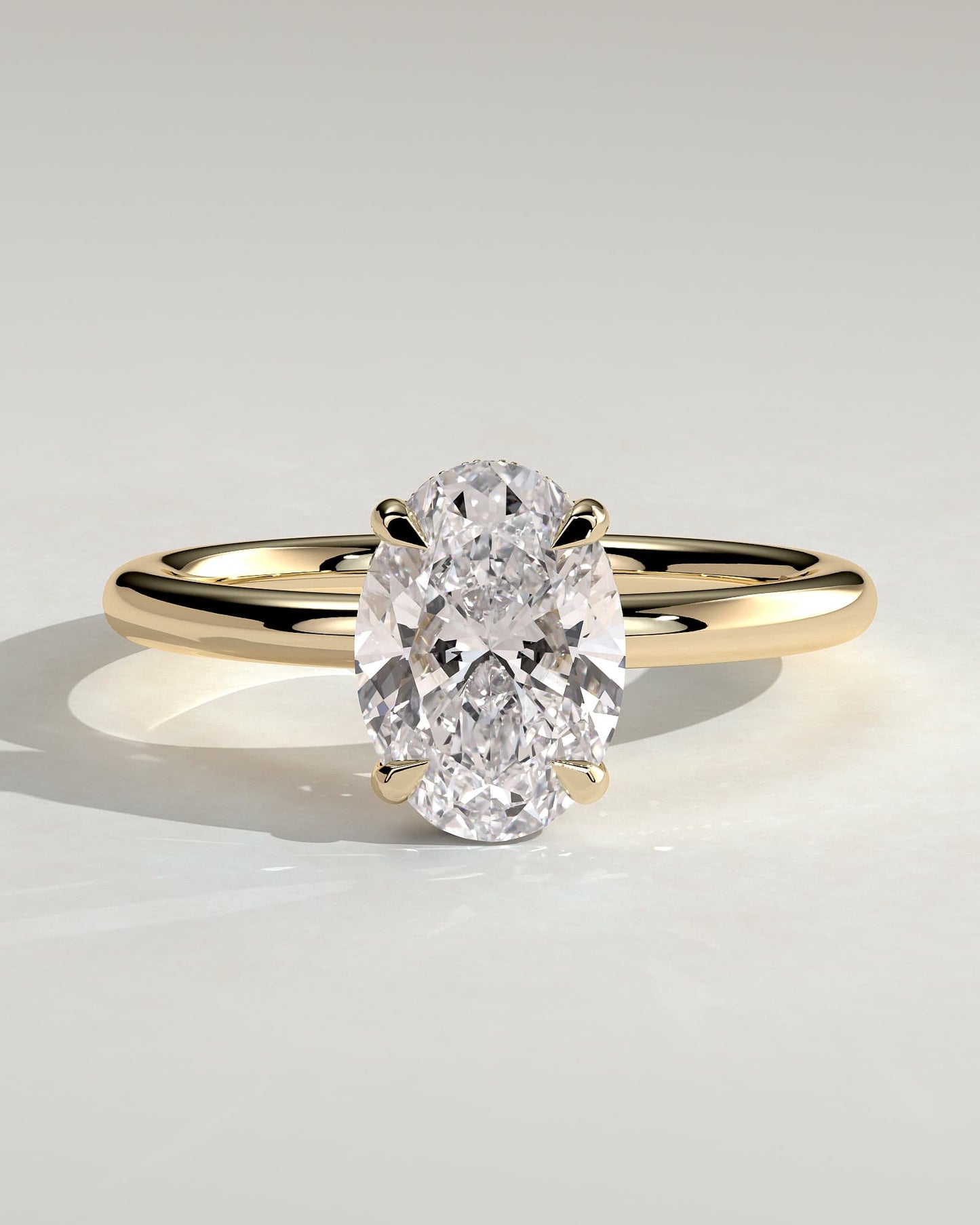 Emma - Classic Oval Claw Solitaire with Hidden Halo Engagement Ring - Yellow Gold