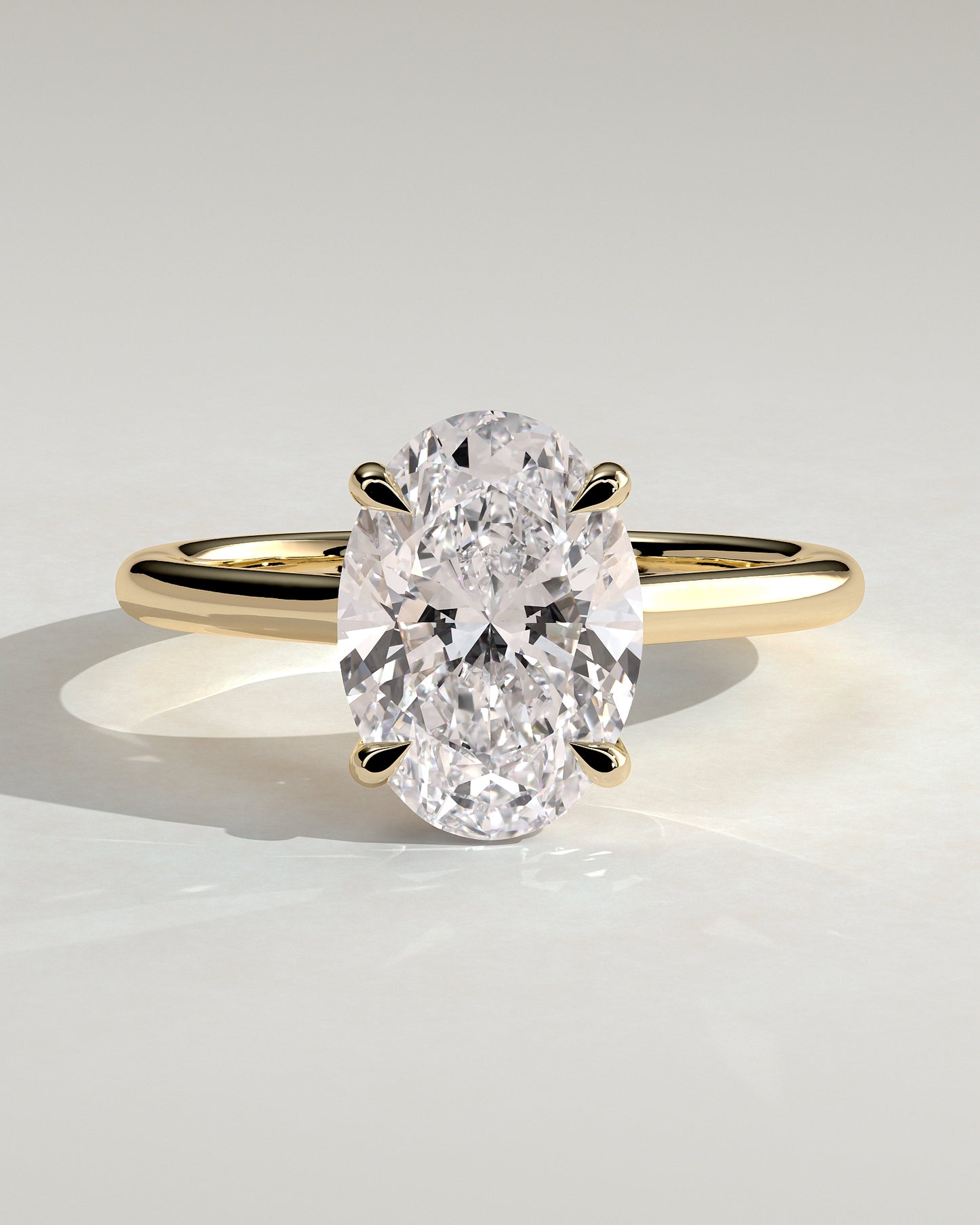 Hilary - Oval Claw Solitaire with Cathedral High Setting Engagement Ring - Yellow Gold