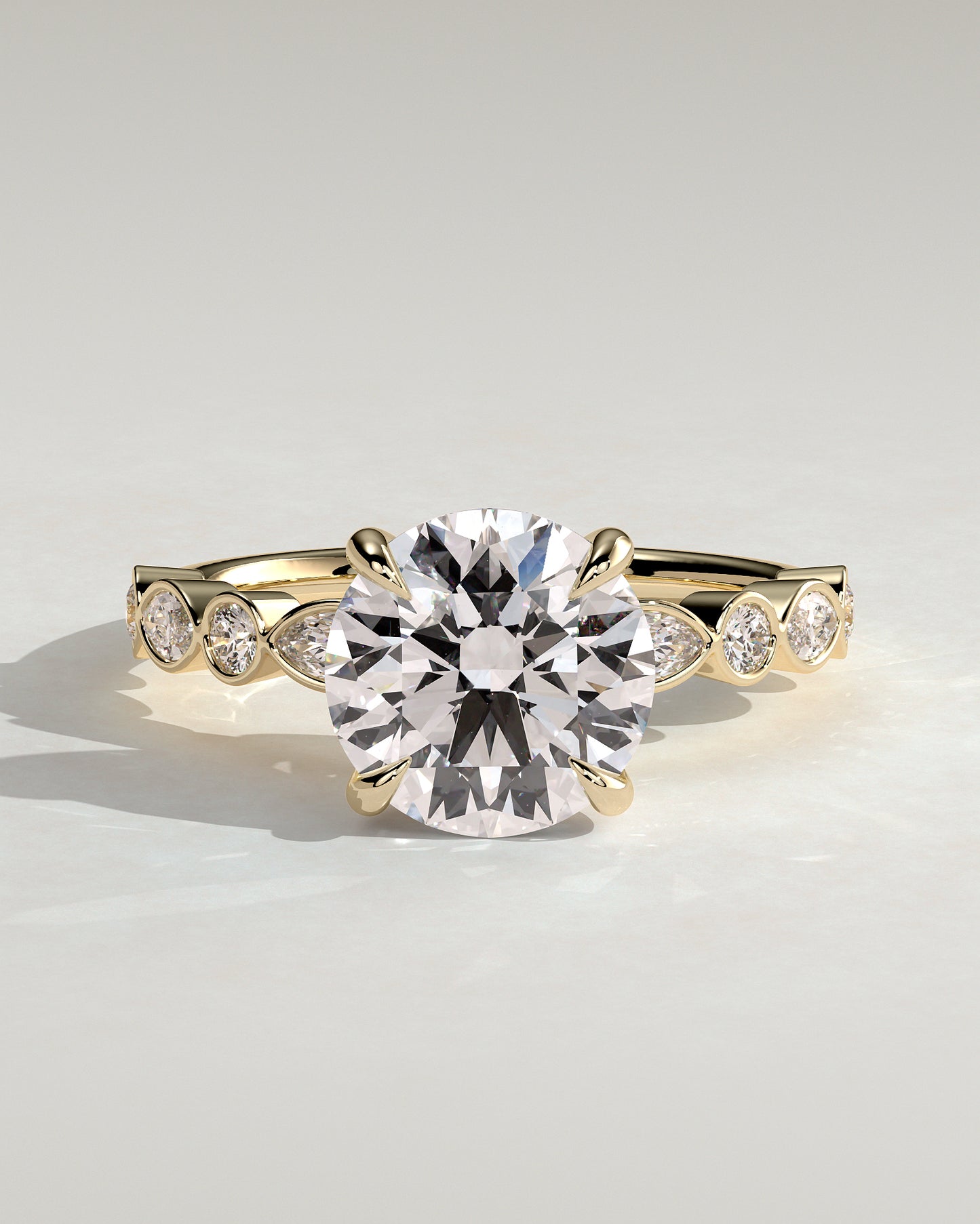 Cartia - Round Claw Solitaire with Round-Marquise Bezel Accent Stones Engagement Ring - Yellow Gold