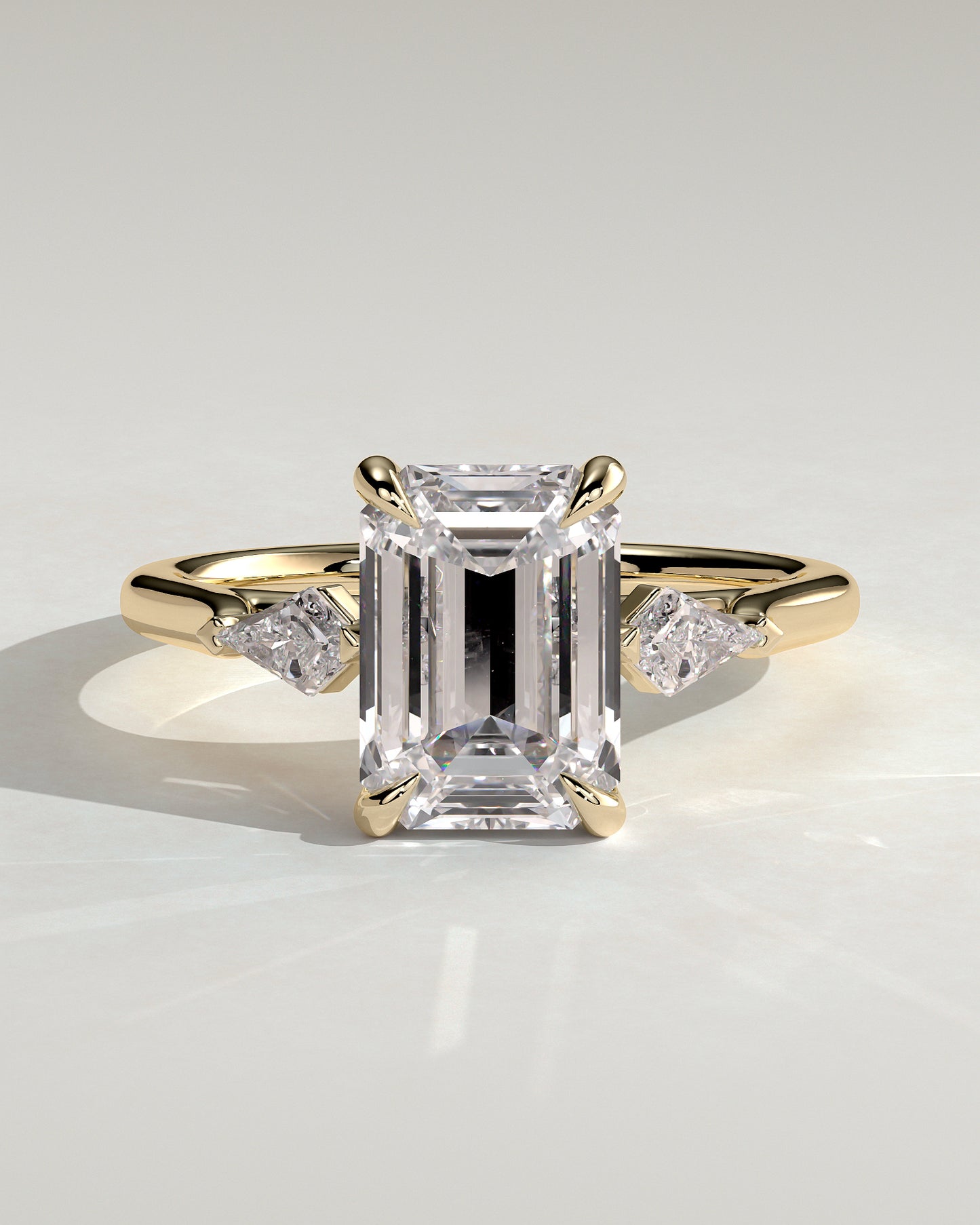 Elphie - Emerald Claw Trilogy with Kite Side Stones Engagement Ring - Yellow Gold