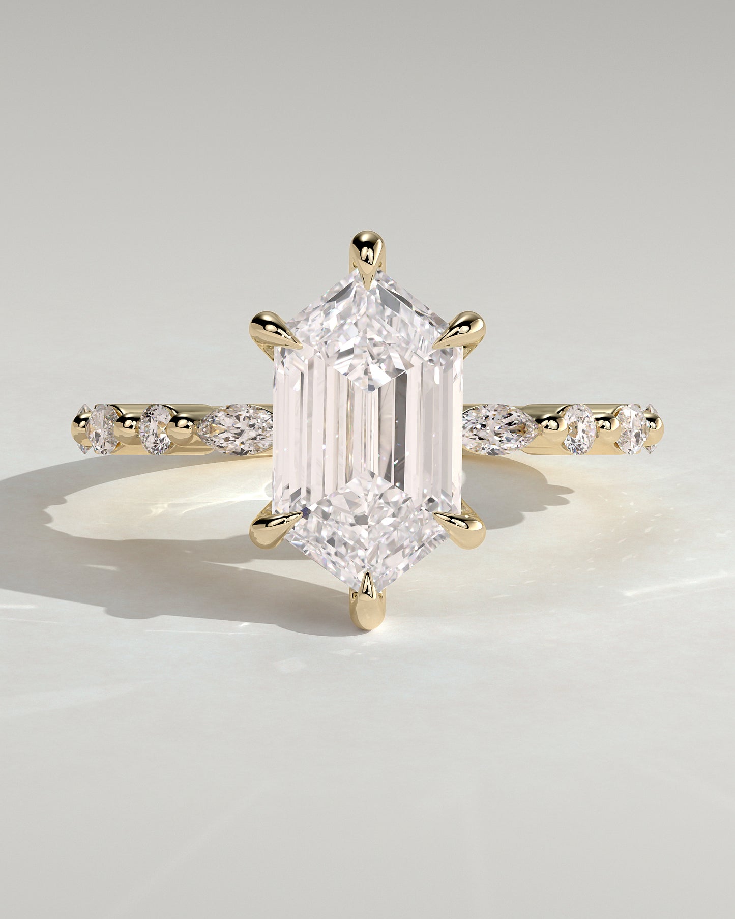 Agnes - Elongated Hexagon Claw Solitaire with Marquise and Round Accent Stones Engagement Ring - Yellow Gold