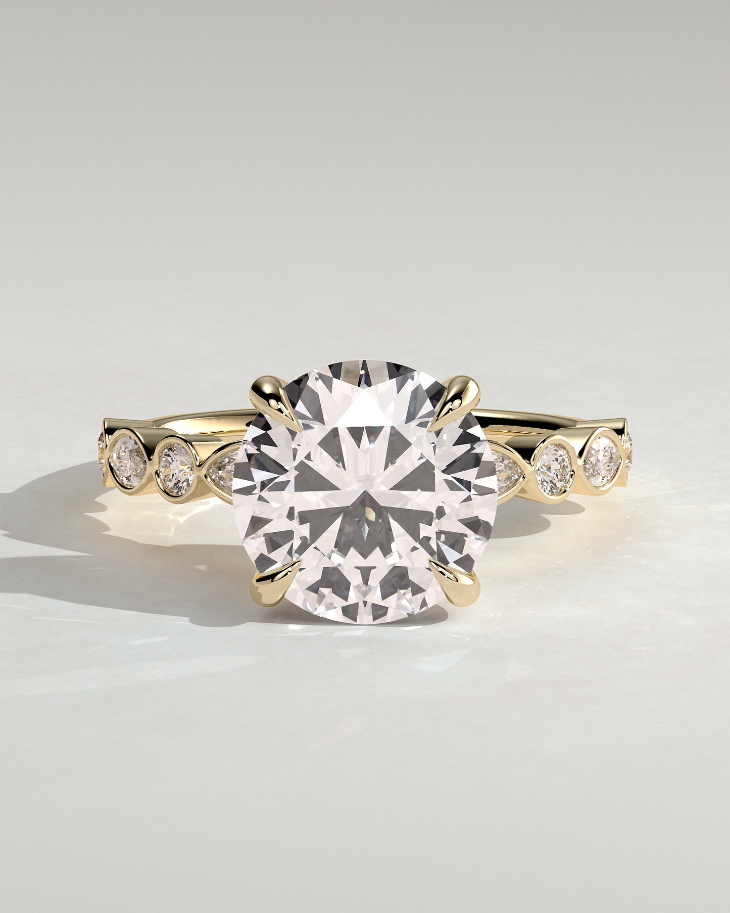 Cartia - Round Claw Solitaire with Round-Marquise Bezel Accent Stones Engagement Ring - Yellow Gold