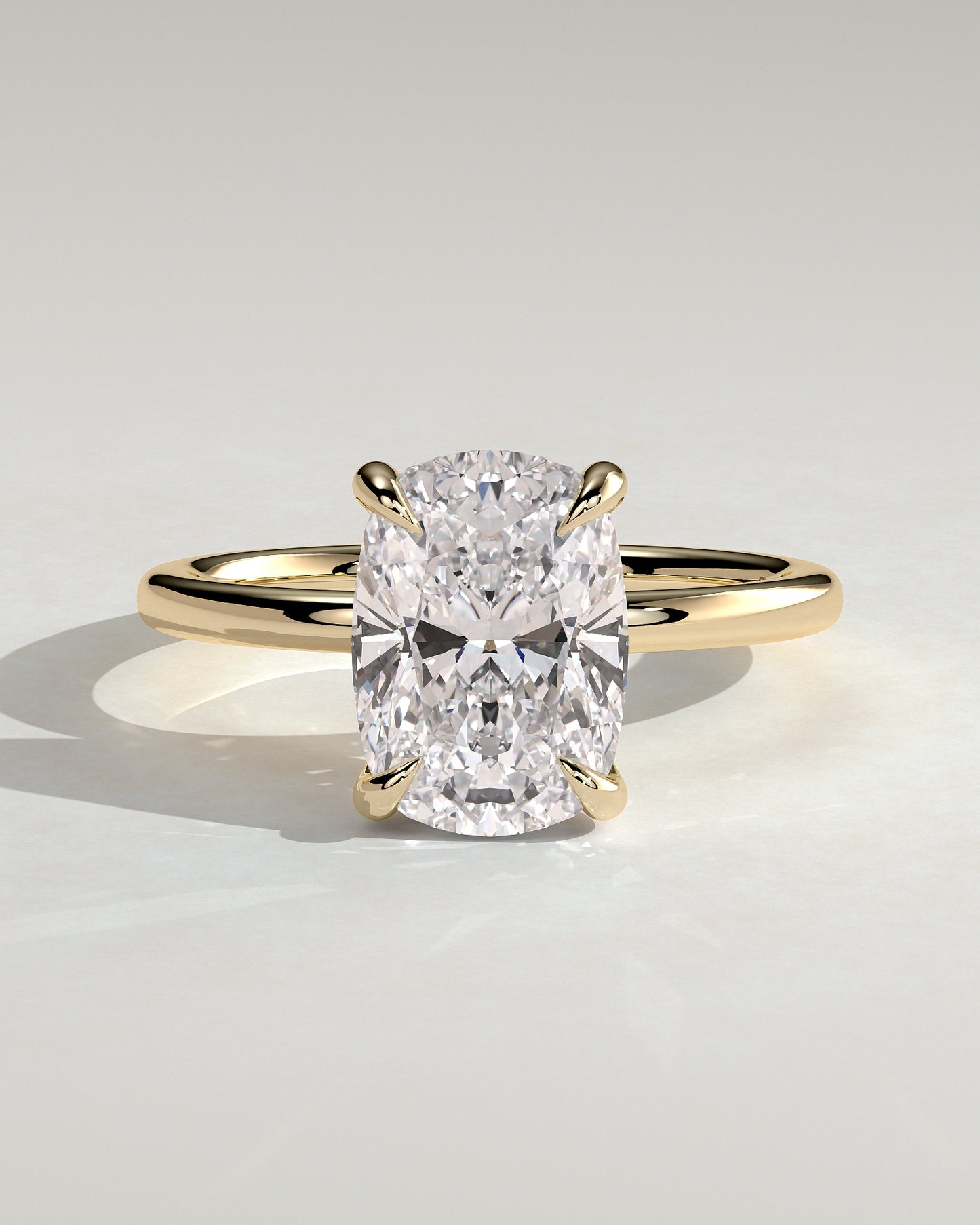 Ava - Elongated Cushion Claw Solitaire with Hidden Halo Engagement Ring - Yellow Gold