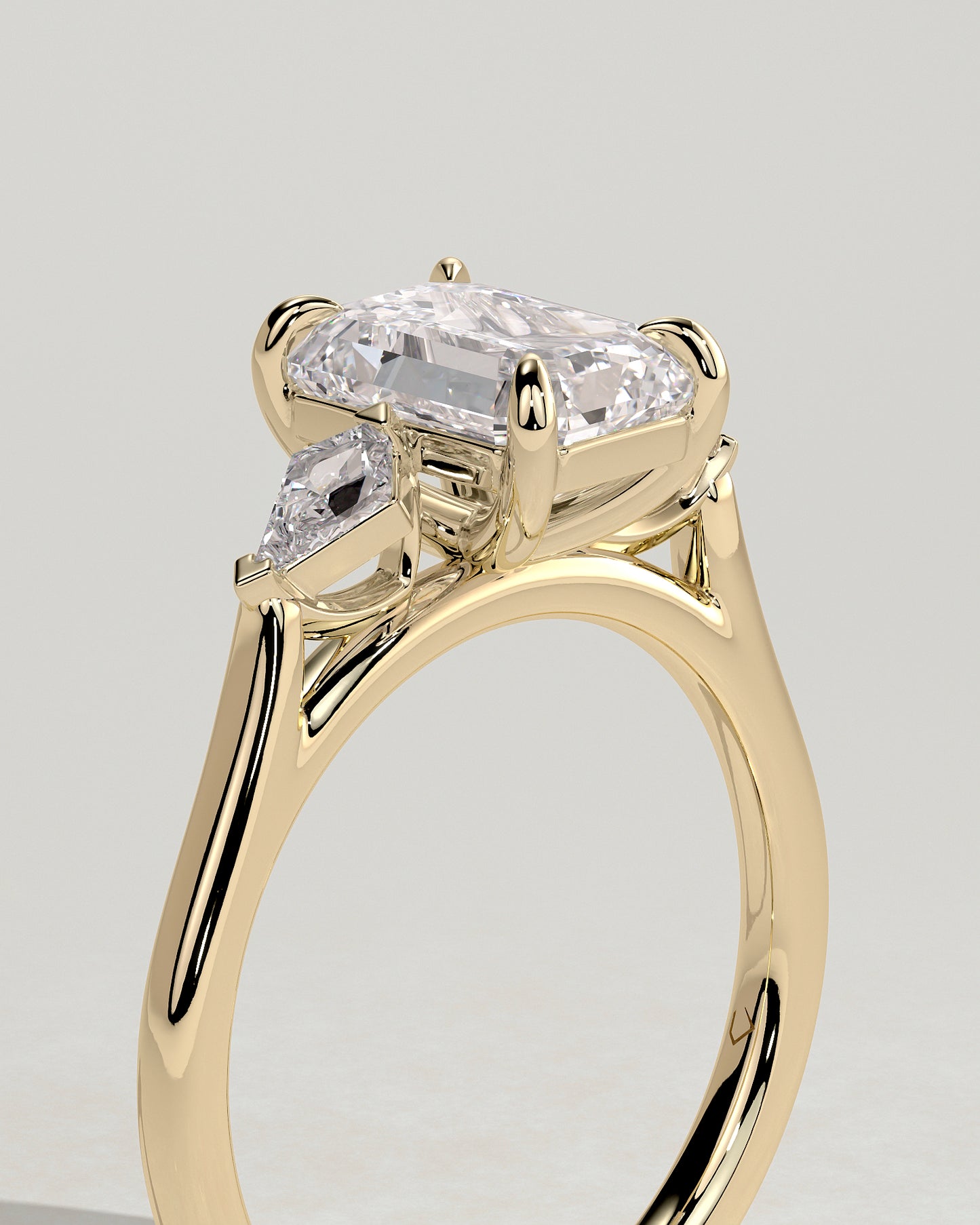 Elphie - Emerald Claw Trilogy with Kite Side Stones Engagement Ring - Platinum