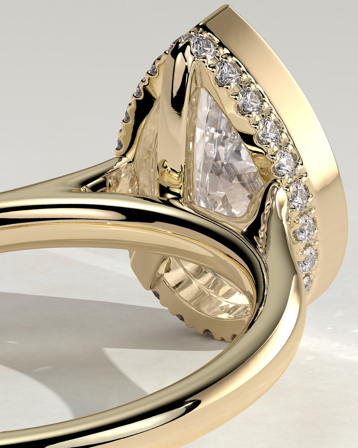 Jude - Pear Bezel Solitaire with Hidden Halo and Cathedral High Setting Engagement Ring - Yellow Gold